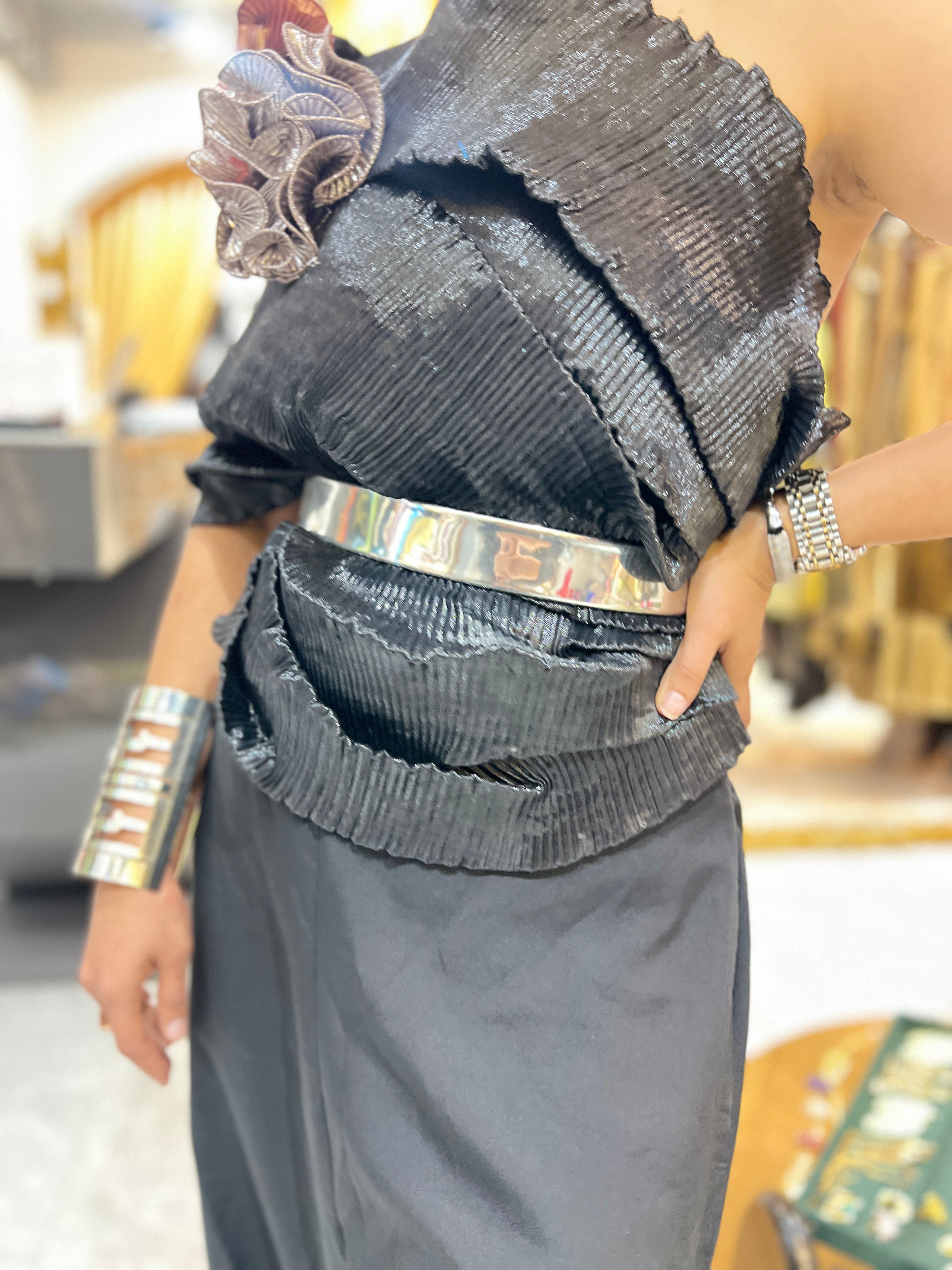 Black multidrape jumpsuit with silver belt