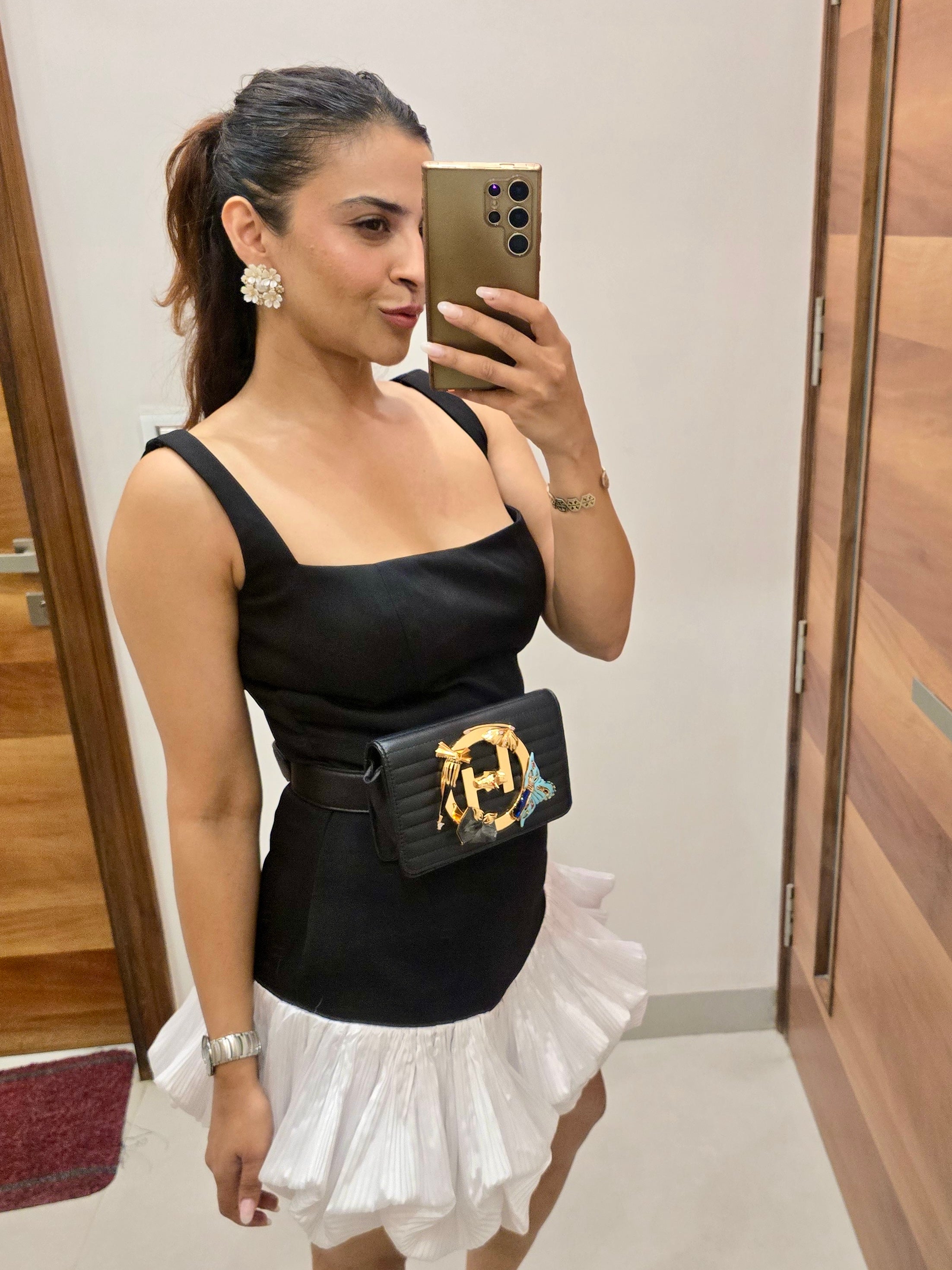 Peplum strappy dress in black