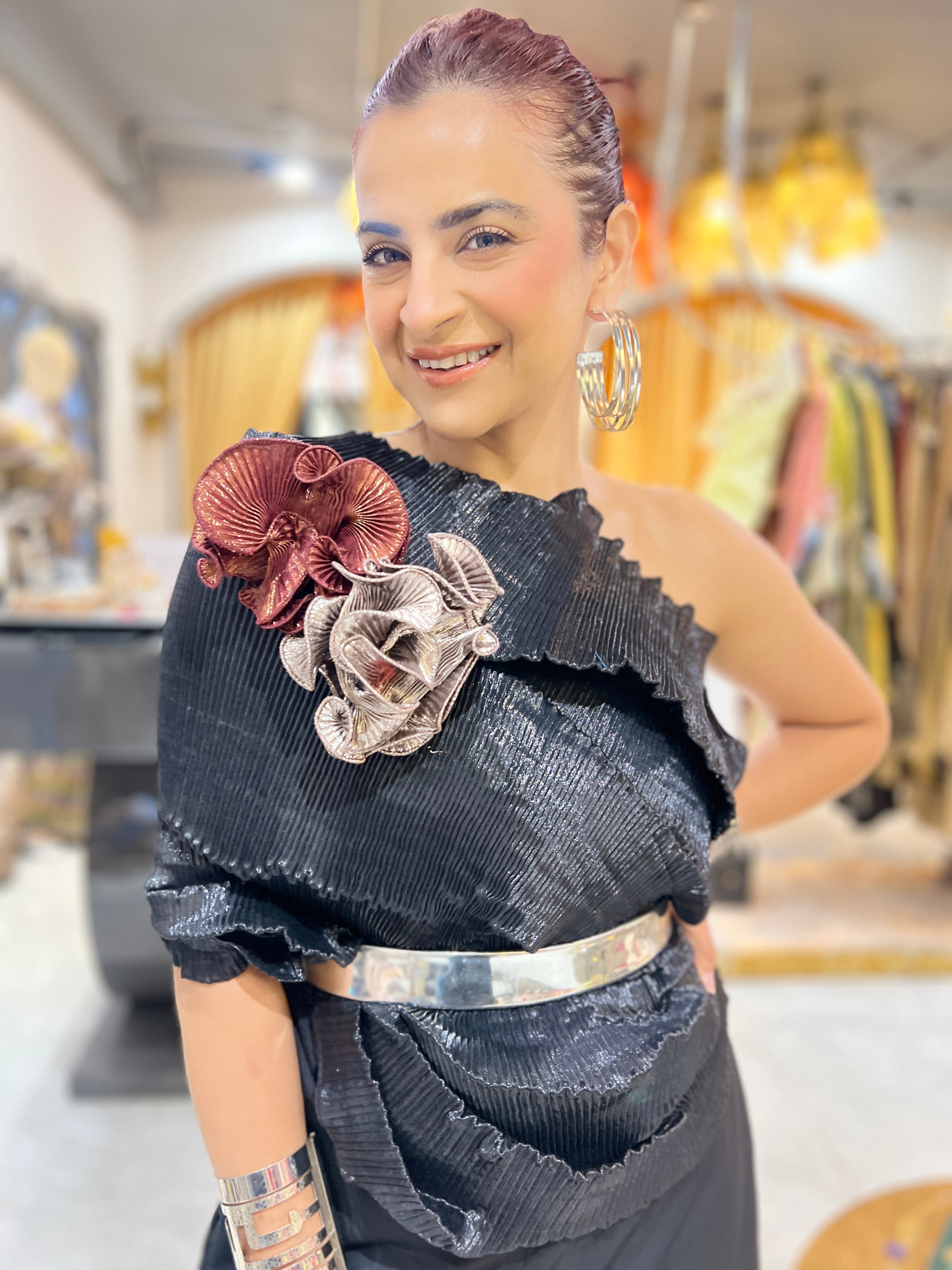 Black multidrape jumpsuit with silver belt