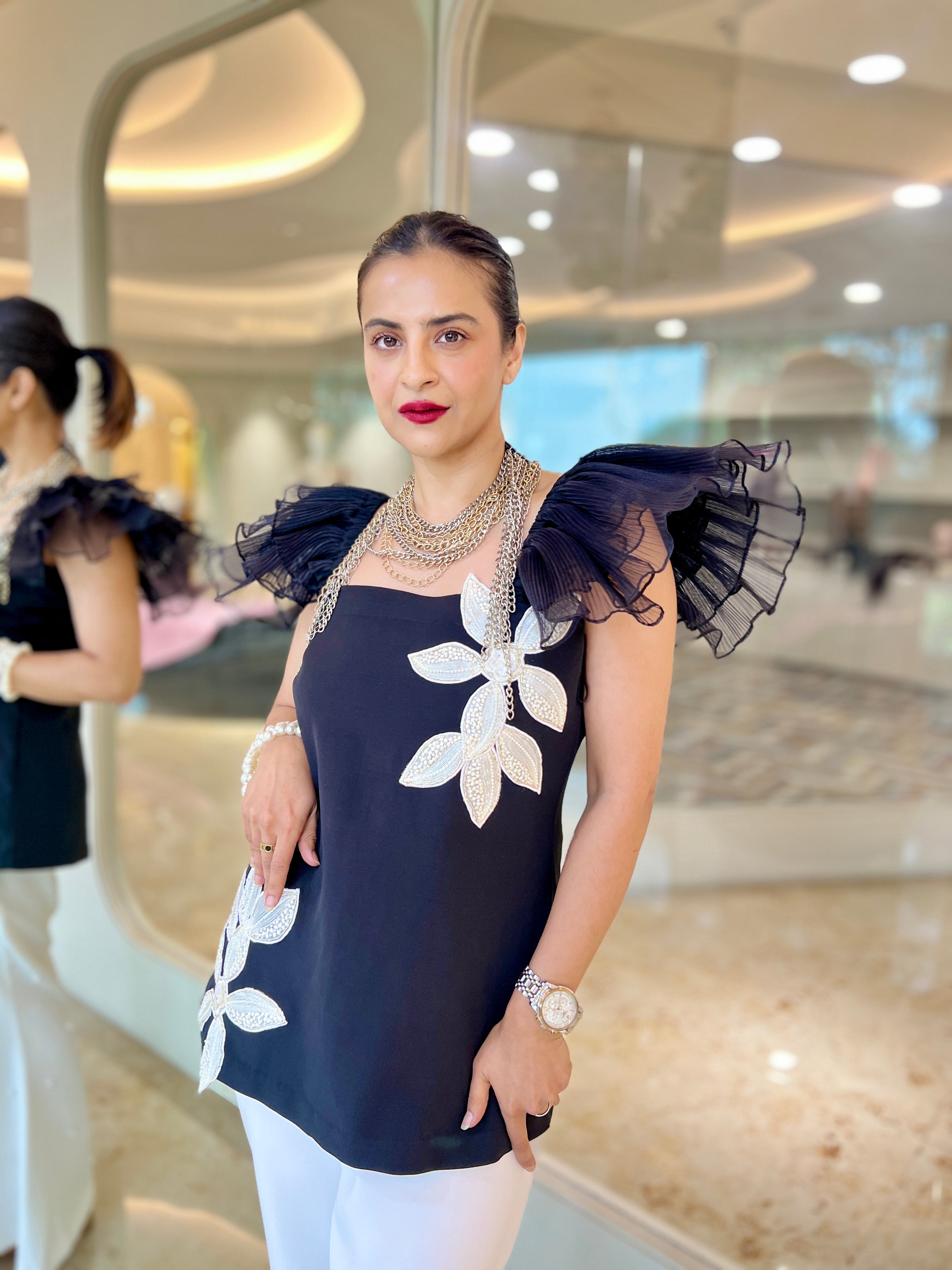 Black tube embroidered top