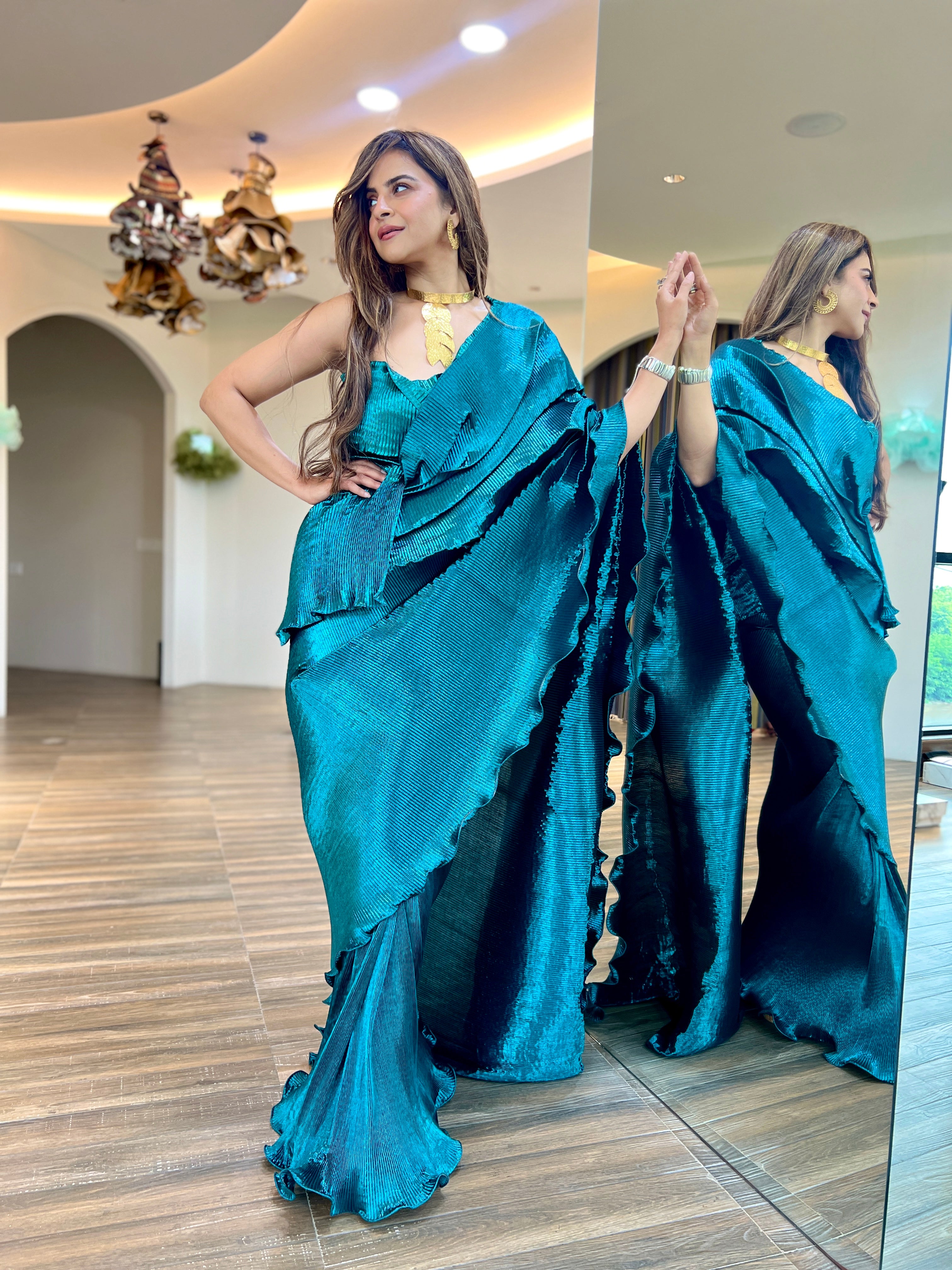 Teal blue pre draped shimmer silk saree